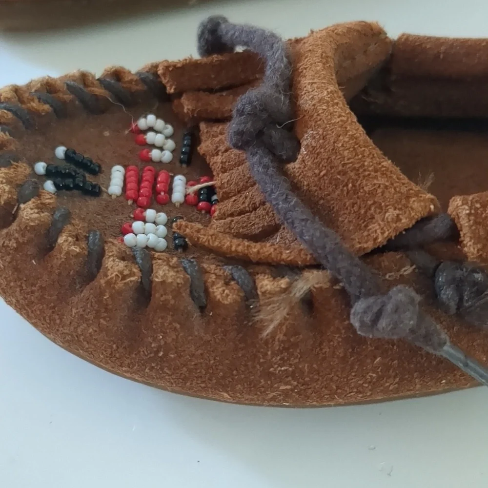 Minnetonka beaded thunderbird slip on Moccasin